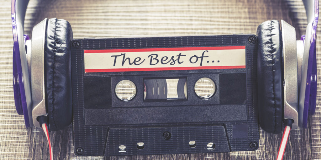 Vintage cassette tape with purple headphones and The Best of label