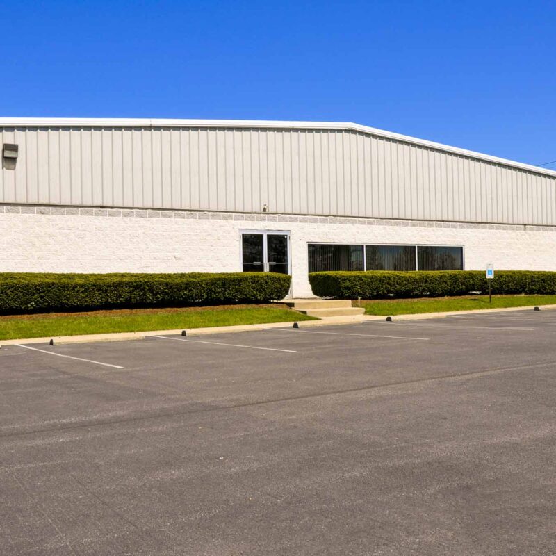 Commercial metal building with parking lot exterior