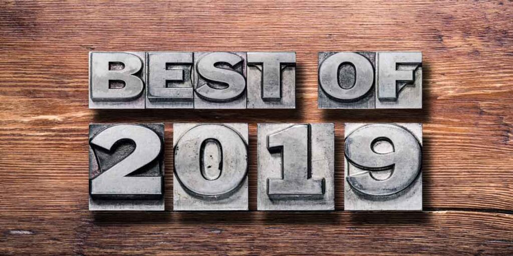 “Best of 2019” metal letter blocks on wood background