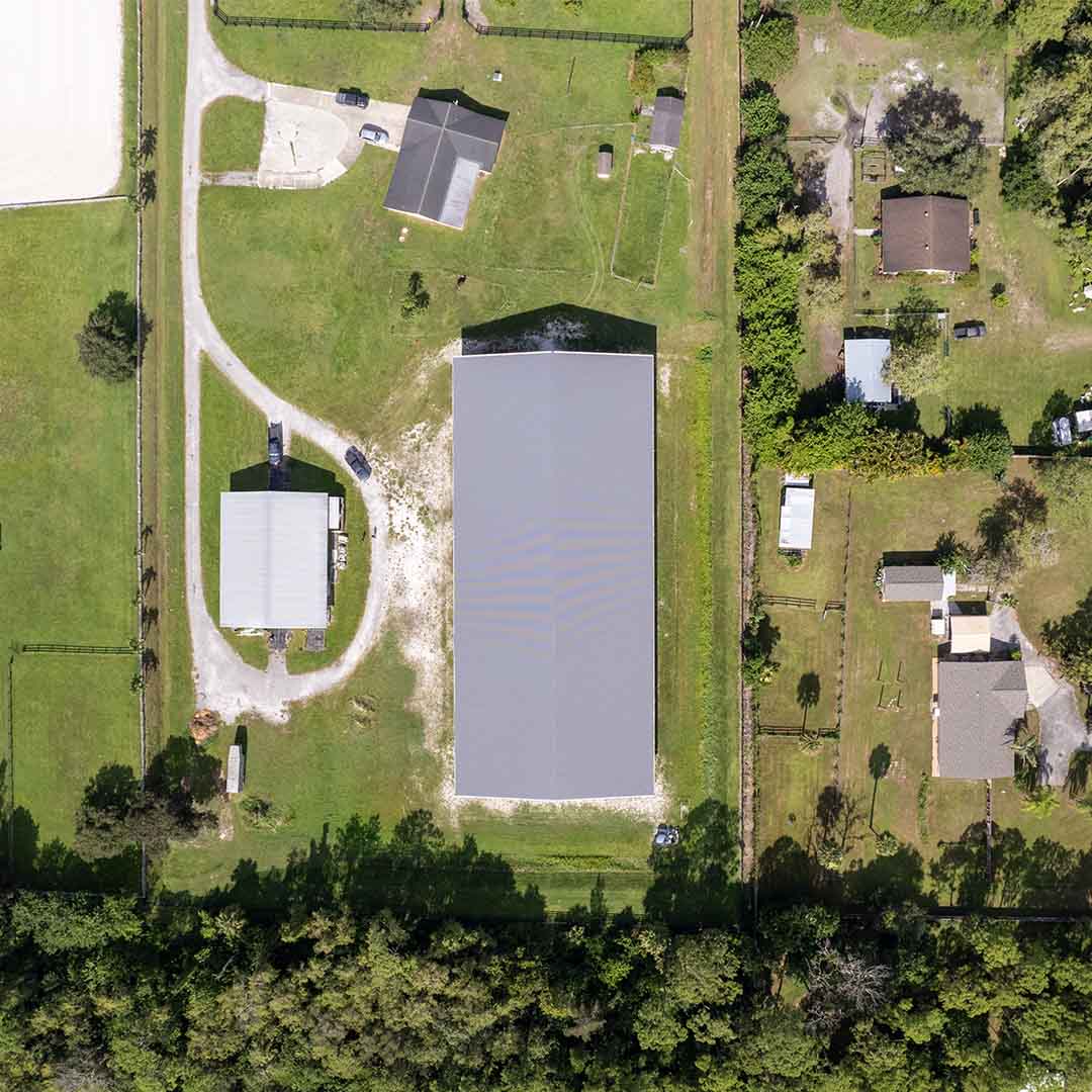 Aerial View of Metal Buildings in the Farm Land