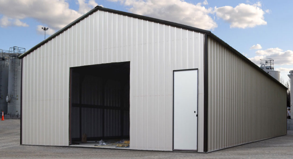 Pre engineered metal building with large garage opening