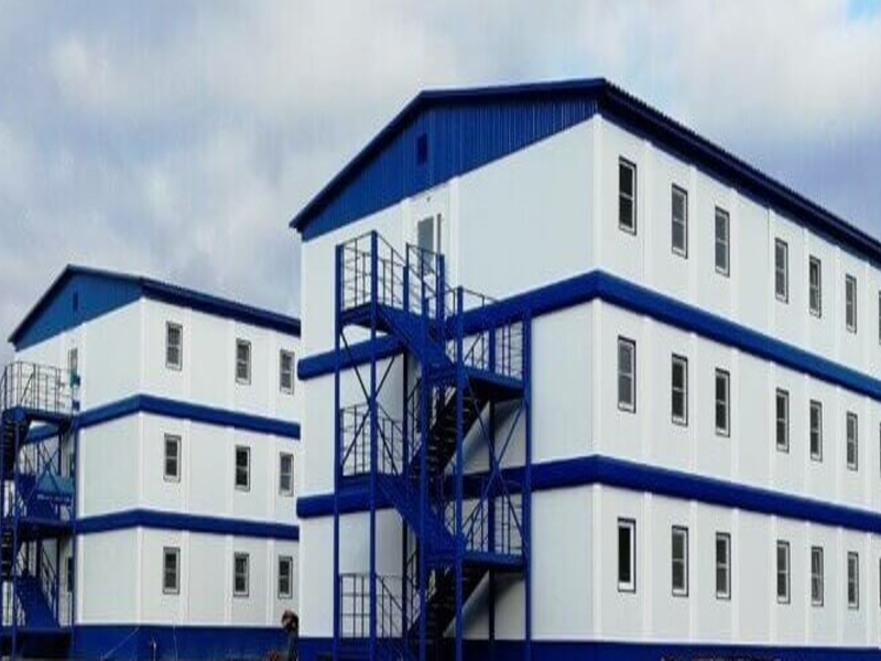 Pre-engineered metal buildings with blue exterior stairs