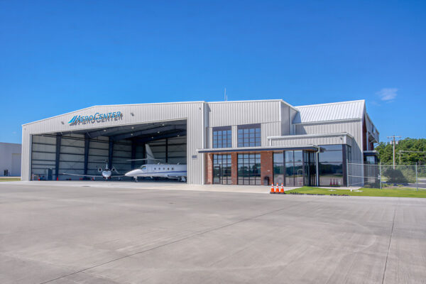 Aircraft hangar and metal building with private jets