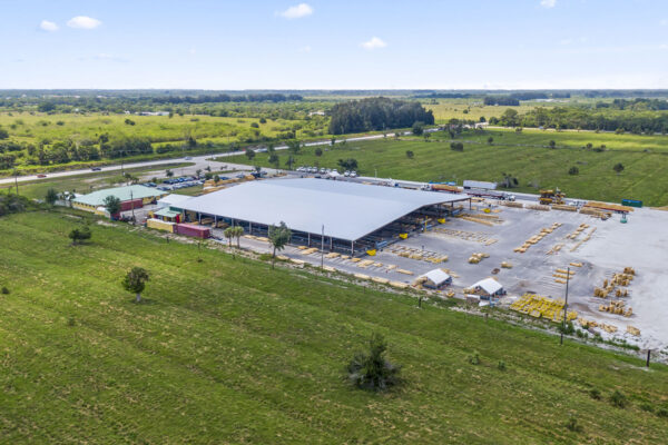 Aerial view of large steel commercial metal building under construction