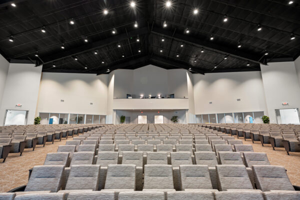 Steel building auditorium with rows of seating