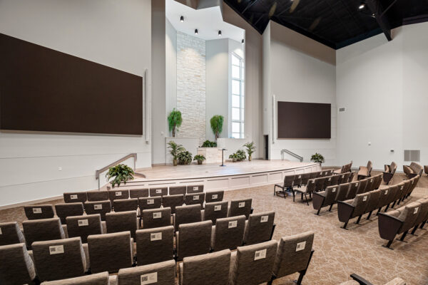 Modern steel building auditorium with stage and seating