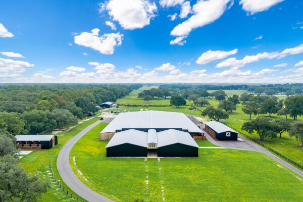Aerial view of a steel riding arena used as a roping arena