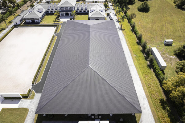 Aerial equestrian steel building with covered riding arena