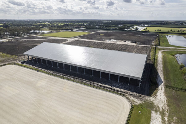 Aerial perspective of expansive equestrian arena built by Coastal Steel Structures