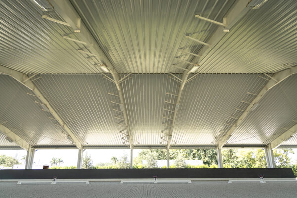 Interior steel riding arena with clean lines and balanced proportions
