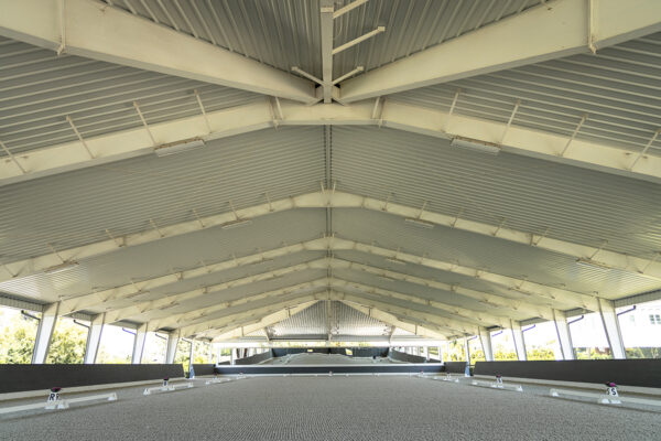 Interior view of steel riding arena structure