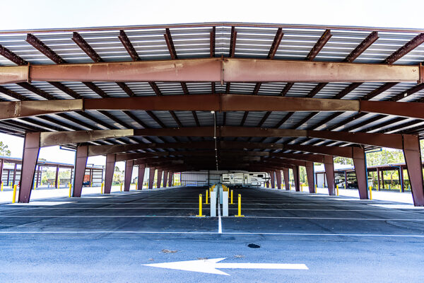 Covered parking under a steel commercial metal building