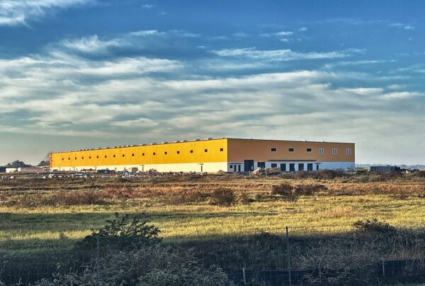 Bauducco Foods pre-engineered metal building with custom yellow panels in Zephyrhills, FL