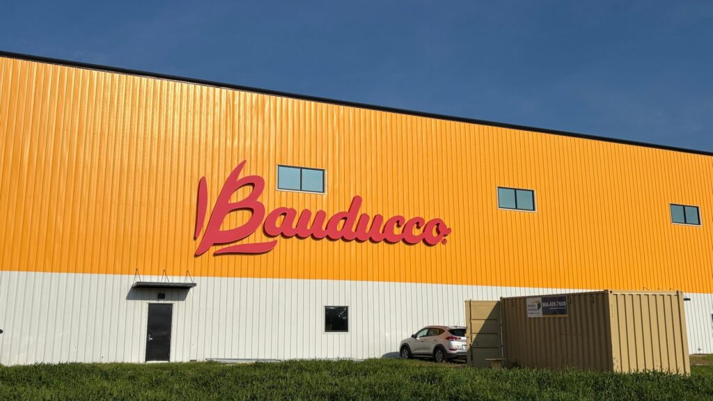 Bauducco Foods production facility with custom yellow metal panels in Zephyrhills, FL