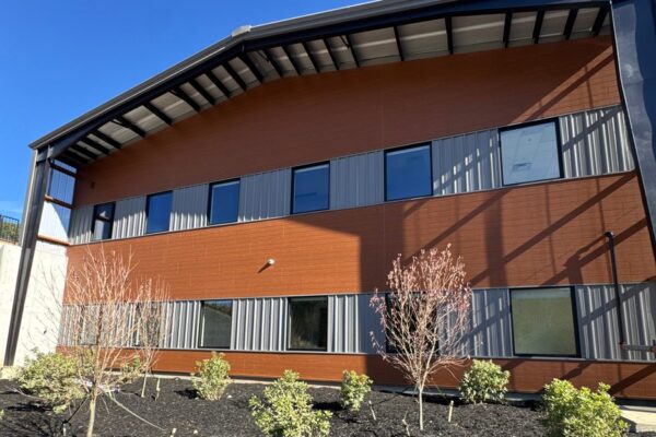 Side elevation of the Ruby-Collins metal office building in Smyrna, GA, clad in fiber cement panels