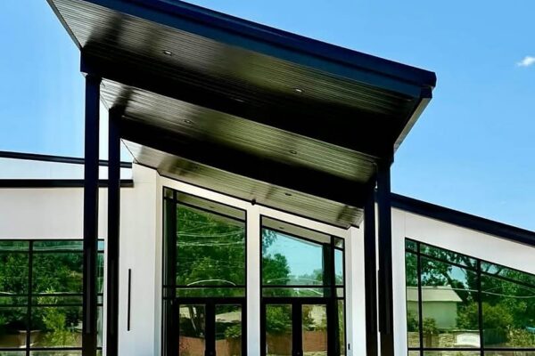 Drop-off canopy at Zion Church supported by I-Beam columns finished to look like tube steel