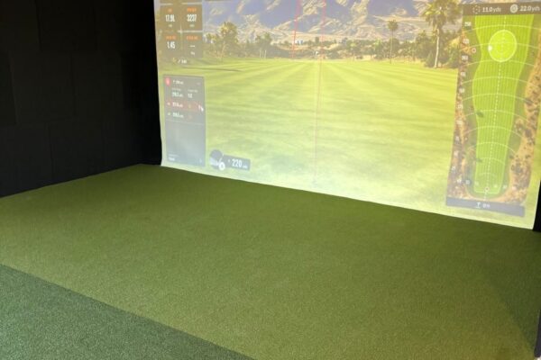 Golf simulator room inside the Ruby-Collins metal office building in Smyrna, GA