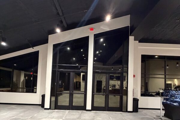 Interior view of the glass entry doors and storefront windows at Zion Church