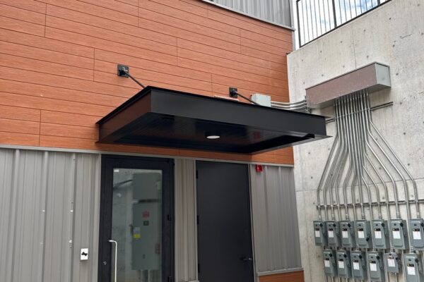 Rear entrance and retaining wall at the Ruby-Collins metal office building in Smyrna, GA