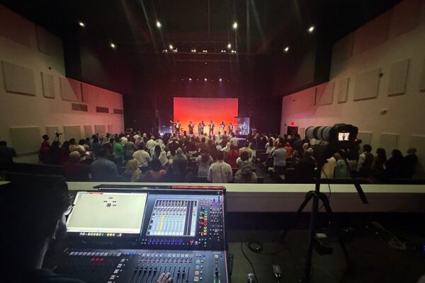 Worship service in the Zion Church sanctuary, viewed from the sound booth toward the stage