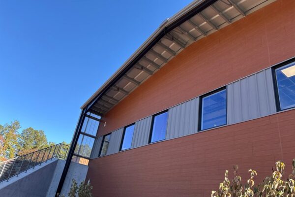Side view of the Ruby-Collins metal office building in Smyrna, GA, showing the eave overhang along the roofline